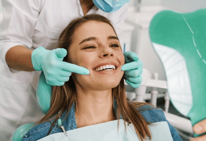 A patient smiling during a routine dental checkup at Annandale Dental Care